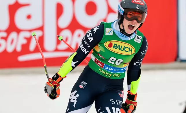 United States' Mikaela Shiffrin celebrates at the finish area of an alpine ski, women's World Cup giant slalom, in Soelden, Austria, Saturday, Oct. 25, 2025. (AP Photo/Marco Trovati)