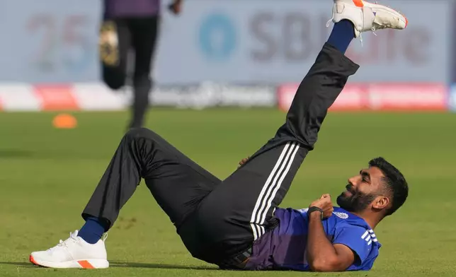 India's Jasprit Bumrah warms up before the start of the first day of the second cricket test match between India and West Indies at the Arun Jaitley Stadium in New Delhi, India, Friday, Oct.10, 2025. (AP Photo/Manish Swarup)