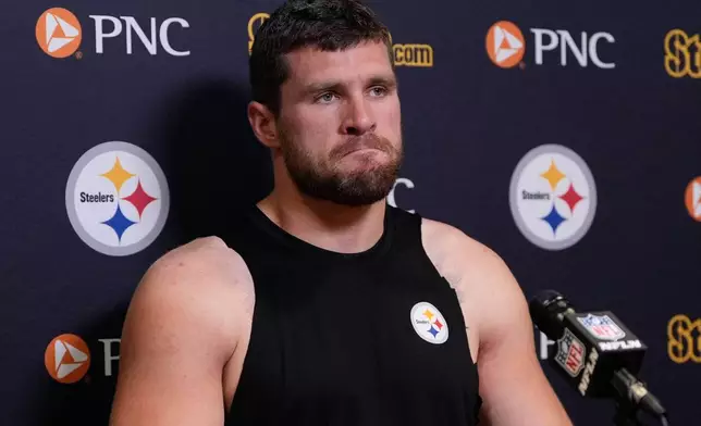 Pittsburgh Steelers outside linebacker T.J. Watt talks with reporters following an NFL football game against the Cincinnati Bengals in Cincinnati Thursday, Oct. 16, 2025. (AP Photo/Carolyn Kaster)