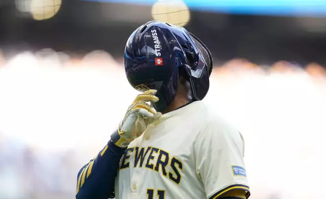 Milwaukee Brewers' Jackson Chourio (11) reacts to leaving the game with an injury during the second inning in Game 1 of baseball's National League Division Series against the Chicago Cubs, Saturday, Oct. 4, 2025, in Milwaukee. (AP Photo/Kayla Wolf)