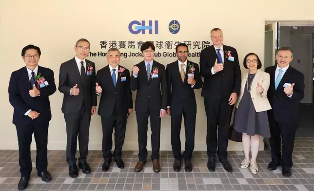Guests tour The Hong Kong Jockey Club Global Health Institute global headquarters and laboratory.