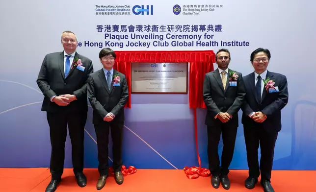 Group photo of Dr Henry Chan, Club Steward (2nd left), and the three co-directors of The Hong Kong Jockey Club Global Health Institute, including Professor Leo Poon (1st right), Professor Ravindra Gupta (2nd right), and Professor Florian Marks (1st left).