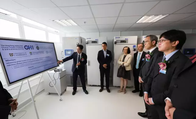 Guests tour The Hong Kong Jockey Club Global Health Institute global headquarters and laboratory.