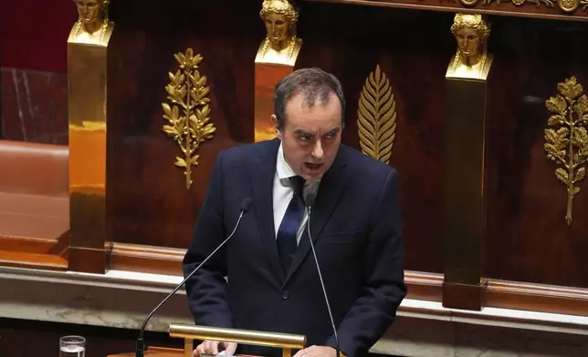 French Prime Minister Sebastien Lecornu delivers his policy speech at the National Assembly, Tuesday, Oct. 14, 2025 in Paris. (AP Photo/Thibault Camus)