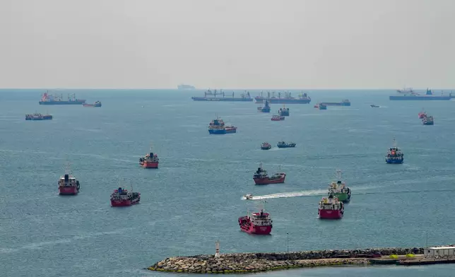 FILE - Cargo ships are anchored in the Sea of Marmara as they await to cross the Bosphorus, in Istanbul, Turkey, April 13, 2025. (AP Photo/Emrah Gurel, File)