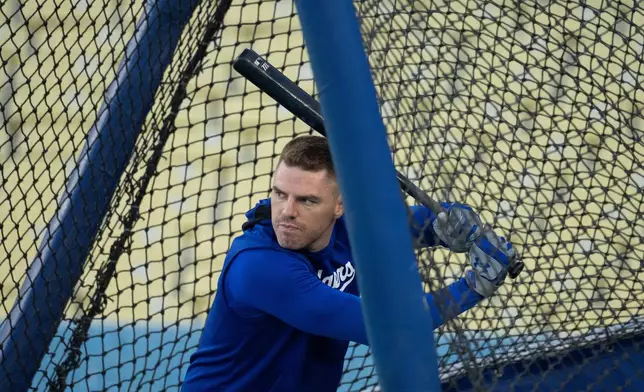 Los Angeles Dodgers' Freddie Freeman takes batting practice during practice Tuesday, Oct. 7, 2025, in Los Angeles, the day before Game 3 of baseball's National League Division Series against the Philadelphia Phillies. (AP Photo/Jae C. Hong)