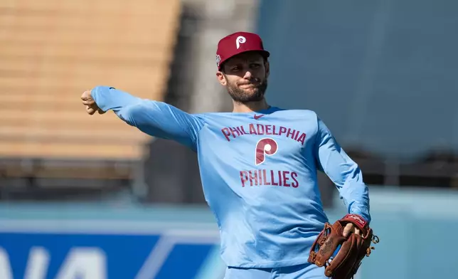 Philadelphia Phillies' Trea Turner works out during practice Tuesday, Oct. 7, 2025, in Los Angeles, the day before Game 3 of baseball's National League Division Series against the Los Angeles Dodgers. (AP Photo/Jae C. Hong)