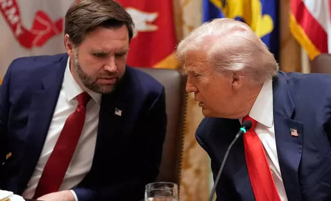 President Donald Trump listens to Vice President JD Vance during a meeting with Argentina's President Javier Milei in the Cabinet Room of the White House, Tuesday, Oct. 14, 2025, in Washington. (AP Photo/Alex Brandon)
