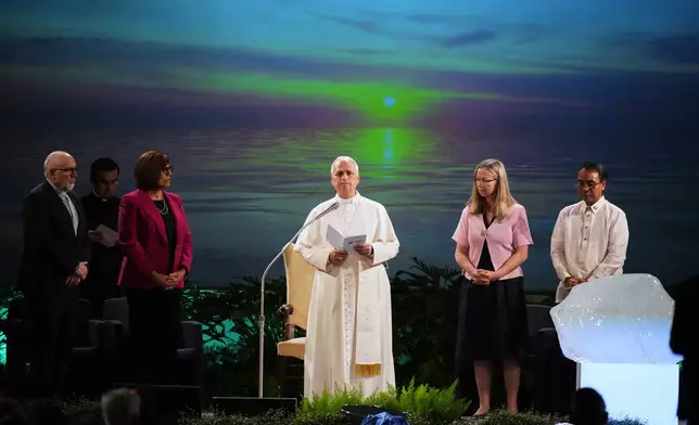 Pope Leo XIV attends the International conference "Raising Hope for Climate Justice", in Castel Gandolfo, Italy, Wednesday, Oct. 1, 2025. (AP Photo/Alessandra Tarantino)