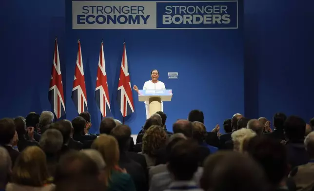 Britain's Conservative Party leader Kemi Badenoch delivers her keynote speech to the Conservative Party Conference at the Manchester Central Convention Complex, in Manchester, England, Wednesday, Oct. 8, 2025. (Danny Lawson/PA via AP)