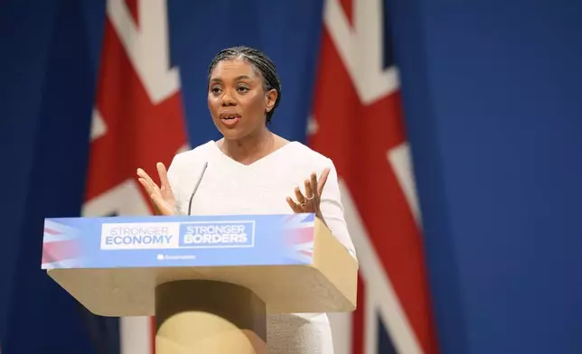 Britain's Conservative Party leader Kemi Badenoch delivers her keynote speech to the Conservative Party Conference at the Manchester Central Convention Complex, in Manchester, England, Wednesday, Oct. 8, 2025. (Danny Lawson/PA via AP)