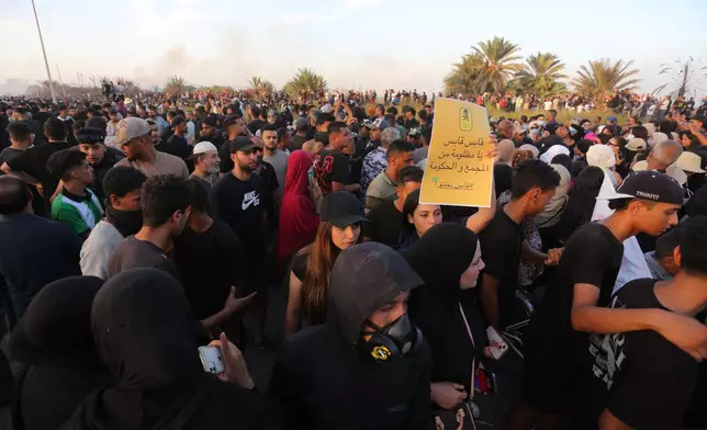 People take part in a demonstration against pollution caused by chemical factories, in Gabes, Tunisia, Wednesday, Oct. 16, 2025. (AP Photo/Bassem Aouini)