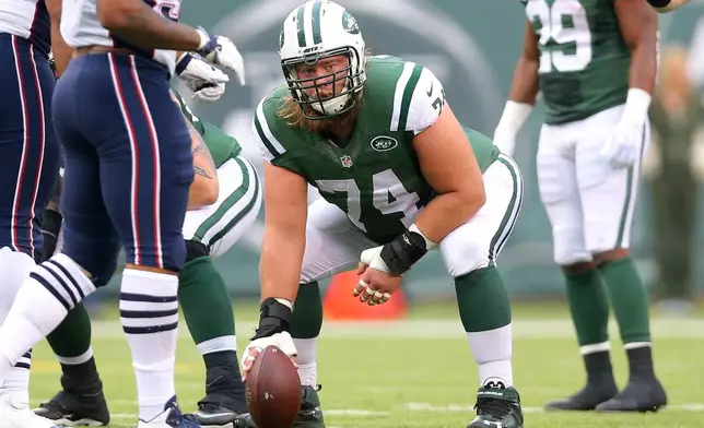 FILE - New York Jets center Nick Mangold (74) lines up against the New England Patriots during an NFL game at MetLife Stadium in East Rutherford, N.J. on Sunday, Dec. 27, 2015. (AP Photo/Brad Penner, File)