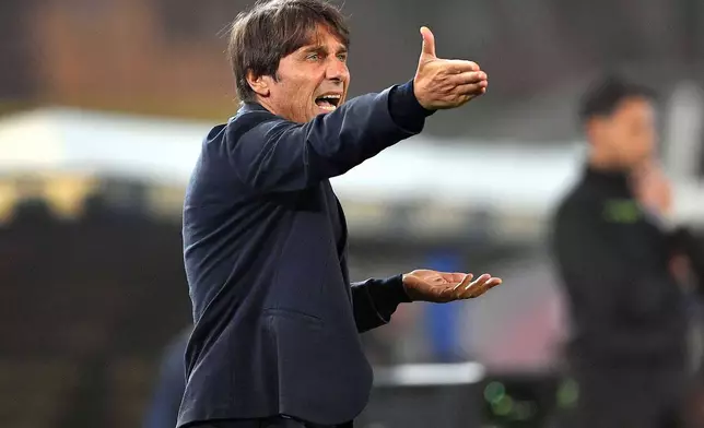 Napoli's head coach Antonio Conte gestures during the Serie A soccer match between Lecce and Napoli, in Lecce, Italy, Tuesday Oct. 28, 2025. (Giovanni Evangelista/LaPresse via AP)