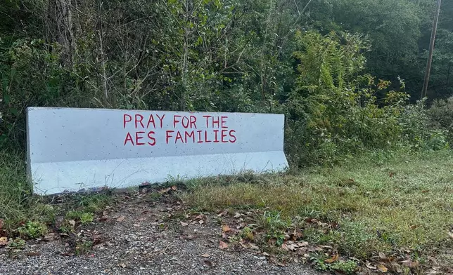 A sign is displayed near the site of an explosion at a explosives manufacturing plant about 60 miles southwest of Nashville, Tenn., on Saturday, Oct. 11, 2025. (AP Photo/Adrian Sainz)