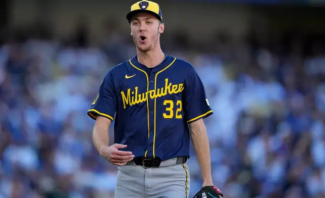 Milwaukee Brewers pitcher Jacob Misiorowski celebrates the end of third inning in Game 3 of baseball's National League Championship Series against the Los Angeles Dodgers, Thursday, Oct. 16, 2025, in Los Angeles. (AP Photo/Brynn Anderson)