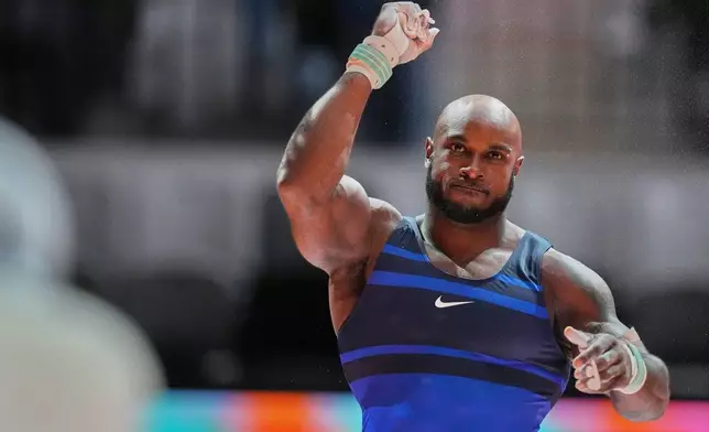 Donnell Whittenburg of the United States reacts after competing in the men's rings final during the 53rd Artistic Gymnastics World Championships in Jakarta, Indonesia, Friday, Oct. 24, 2025. (AP Photo/Achmad Ibrahim)