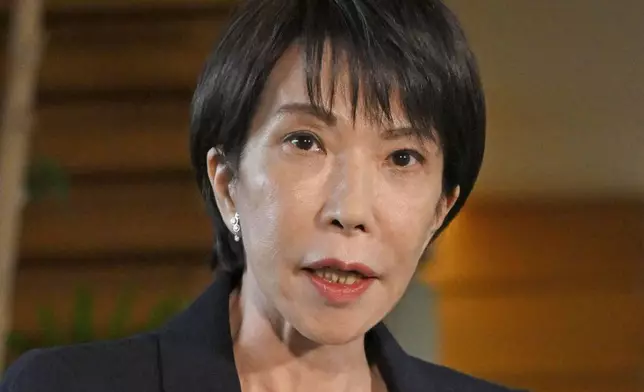 Japan Prime Minister Sanae Takaichi speaks to the media regarding the report that North Korea performed missile tests, at the prime minister's office in Tokyo, Wednesday, Oct. 22, 2025. (Tsuyoshi Ueda/Kyodo News via AP)