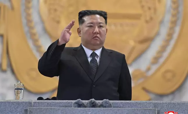 In this photo provided by North Korean government, North Korean leader Kim Jong Un attends the military parade marking the 80th anniversary of the founding of the ruling Worker's Party, in Pyongyang, North Korea, Friday, Oct. 10, 2025. Independent journalists were not given access to cover the event depicted in this image distributed by the North Korean government. The content of this image is as provided and cannot be independently verified. Korean language watermark on image as provided by source reads: "KCNA" which is the abbreviation for Korean Central News Agency. (Korean Central News Agency/Korea News Service via AP)