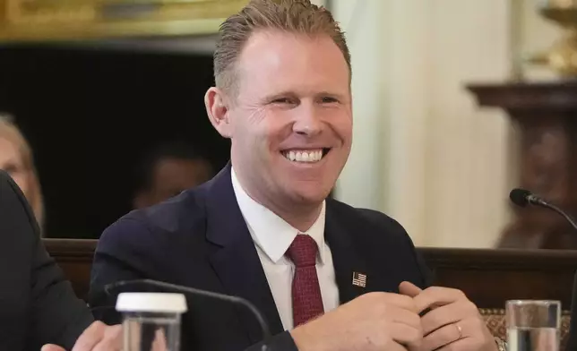 FILE - Andrew Giuliani listens as President Donald Trump speaks during a FIFA task force meeting on the 2026 FIFA World Cup in the East Room of the White House, May 6, 2025, in Washington. (AP Photo/Mark Schiefelbein, File)