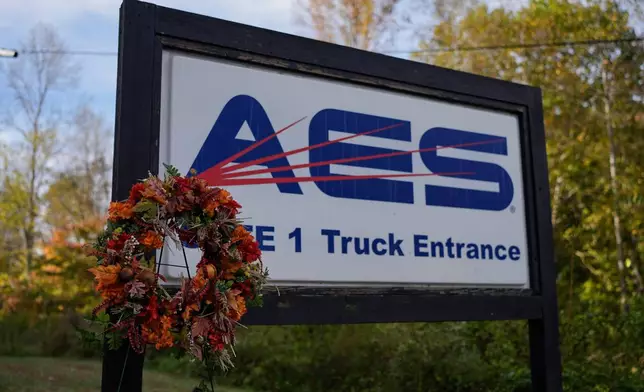 A wreath is seen at the entrance to Accurate Energetic Systems Friday, Oct. 24, 2025, after an explosion killed 16 people on Oct. 10, in McEwen, Tenn. (AP Photo/George Walker IV)