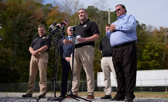 ATF agent Brice McCracken, second from right, speaks about the blast at Accurate Energetic Systems during a news conference Friday, Oct. 24, 2025, in McEwen, Tenn. (AP Photo/George Walker IV)