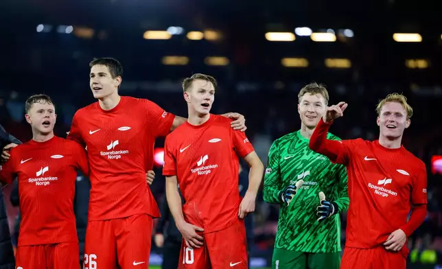 From left: Brann's Eggert Gudmundsson, Eivind Helland, Emil Kornvig, Mathias Dyngeland, and Markus Haaland celebrate after their victory in the Europa League soccer match between SK Brann and Rangers in Bergen, Norway, Thursday Oct. 23, 2025. (Paul S. Amundsen/NTB via AP)