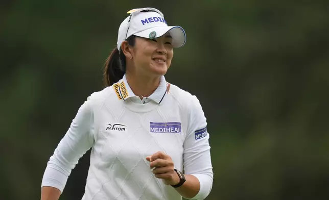 A Lim Kim of South Korea reacts after putting on the first green during the final round of the LPGA Ladies Championship golf tournament at the Pine Beach Golf Links in Haenam, South Korea, Sunday, Oct. 19, 2025. (AP Photo/Lee Jin-man)