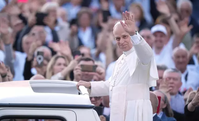 Pope Leo XIV greets pilgrims from Croatia in St. Peter's Square at the Vatican, Tuesday, Oct. 7, 2025. (AP Photo/Andrew Medichini)