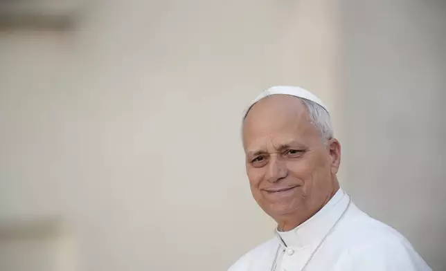 Pope Leo XIV greets pilgrims from Croatia in St. Peter's Square at the Vatican, Tuesday, Oct. 7, 2025. (AP Photo/Andrew Medichini)