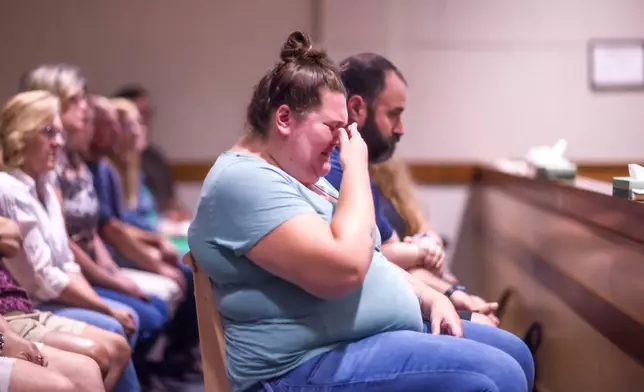 FILE - Savana Hammond, reacts as Eric Sweeney, accused of killing his sister-in-law and two young nephews when he was 16 pleaded guilty to second-degree murder charges, Aug. 15, 2025 at Merrimack County Superior Court in Concord, N.H. (Geoff Forester/ Concord Monitor via AP, Pool, File)