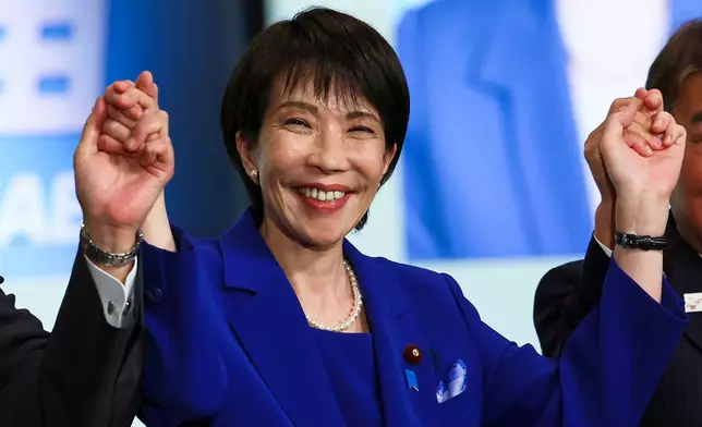 FILE - Newly-elected leader of Japan's Liberal Democratic Party (LDP) Sanae Takaichi celebrates after winning the LDP leadership election in Tokyo, Japan, Oct. 4, 2025. (Kim Kyung-Hoon/Pool Photo via AP, File)