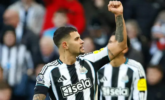Newcastle United's Bruno Guimaraes celebrates scoring during the English Premier League soccer match between Newcastle United and Fulham at St James' Park, Newcastle-upon-Tyne, England, Saturday Oct. 25, 2025. (Richard Sellers/PA via AP)
