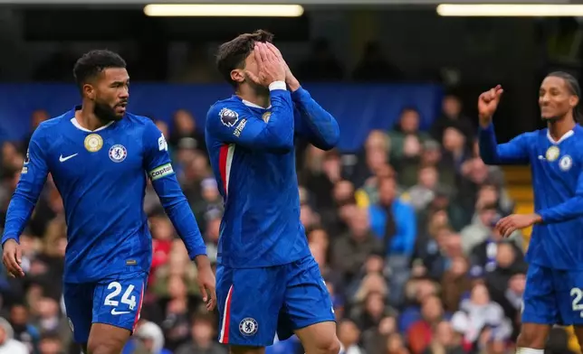 Chelsea's Reece James, Pedro Neto and Joao Pedro, from left, react during the English Premier League soccer match between Chelsea and Sunderland in London, Saturday, Oct. 25, 2025. (AP Photo/Joanna Chan)