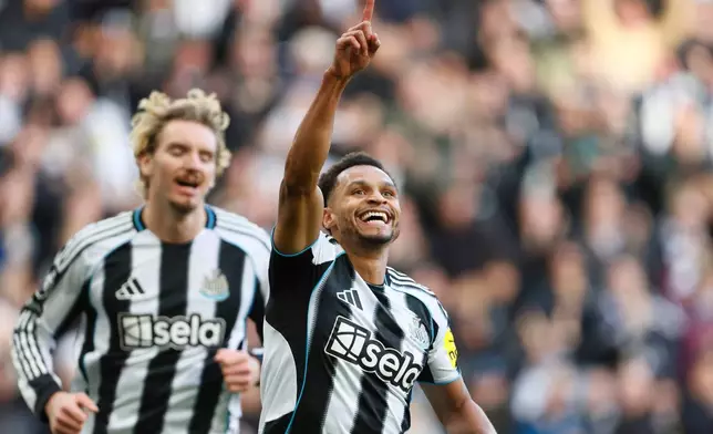 Newcastle United's Jacob Murphy celebrates scoring during the English Premier League soccer match between Newcastle United and Fulham at St James' Park, Newcastle-upon-Tyne, England, Saturday Oct. 25, 2025. (Richard Sellers/PA via AP)