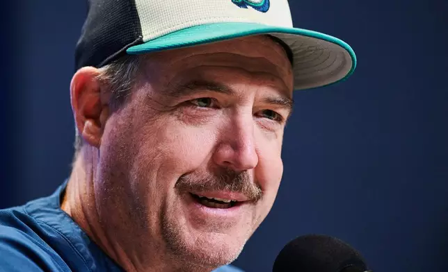 Seattle Mariners manager Dan Wilson speaks to media, Saturday, Oct. 18, 2025, in Toronto, ahead of Sunday's Game 6 in baseball's American League Championship Series against the Toronto Blue Jays. (Sammy Kogan/The Canadian Press via AP)
