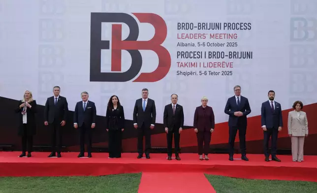 From left to right Presidents of Bosnia and Herzegovina Zeljka Cvijanovic , Denis Becirovic, Zeljko Komsic , Kosovo's President Vjosa Osmani , Croatian President Zoran Milanovic , President of Albania Bajram Begaj, Natasa Pirc Musar, President of Slovenia and Serbian President Aleksandar Vucic, Montenegro President Jakov Milatovic and North Macedonia President Gordana Siljanovska-Davkova pose for a photo during the Brdo-Brijuni, Process Leaders' Meeting in Golem, Albania, 50 kilometers (30 miles) west of the capital, Tirana , Albania on Monday, Oct. 6, 2025 .(AP Photo/Vlasov Sulaj)