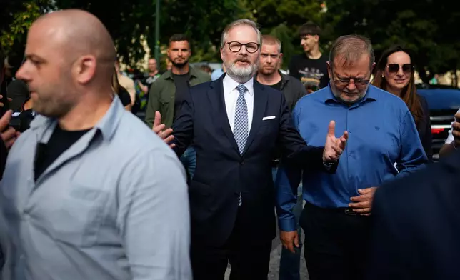 Czech Republic's Prime Minister and leader of coalition of three conservative parties called "Together" Petr Fiala talks to his supporters during a rally ahead of Parliamentary elections in Prague, Czech Republic, Sept. 3, 2025. (AP Photo/Petr David Josek)