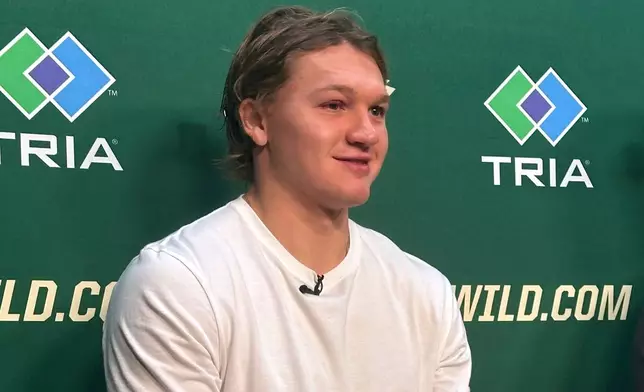 Minnesota Wild left wing Kirill Kaprizov discusses his contract extension during a news conference on Tuesday, Sept. 30, 2025, in St. Paul, Minn. (AP Photo/Dave Campbell)