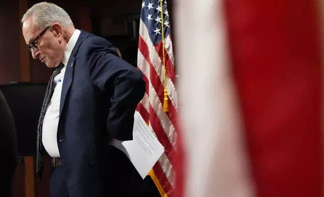 Senate Minority Leader Chuck Schumer of N.Y., listens as he speaks to reporters Tuesday, Sept. 30, 2025, at the U.S. Capitol in Washington. (AP Photo/Jacquelyn Martin)