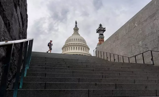 Stairs lead to the Capitol Visitors Center with just days to go before federal money runs out with the end of the fiscal year, in Washington, Wednesday, Sept. 24, 2025. (AP Photo/J. Scott Applewhite)