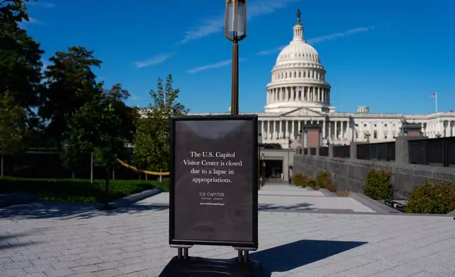 A sign announces that the U.S. Capitol Visitor Center is closed, on the first day of a partial government shutdown, Wednesday, Oct. 1, 2025, in Washington. (AP Photo/Julia Demaree Nikhinson)