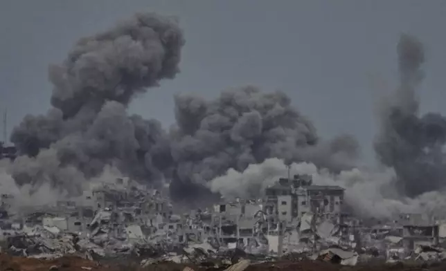 Smoke rises to the sky following an Israeli military strike in the Gaza Strip, as seen from southern Israel, Thursday, Oct. 9, 2025, following the announcement that Israel and Hamas have agreed to the first phase of a peace plan to pause the fighting. (AP Photo/Ariel Schalit)