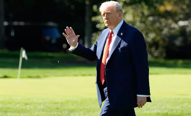 President Donald Trump walks to board Marine One on the South Lawn of the White House, Friday, Oct. 10, 2025, in Washington, as he heads to Walter Reed National Military Center. (AP Photo/Alex Brandon)