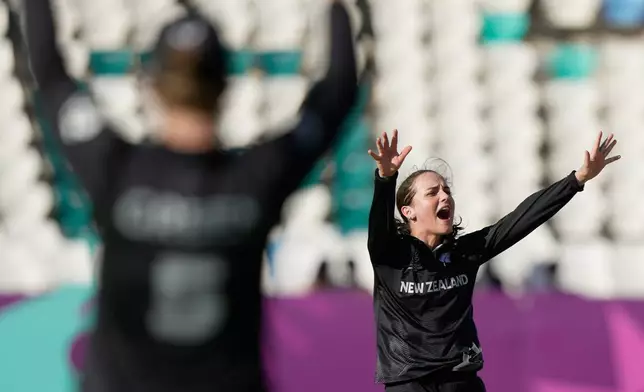 New Zealand's Amelia Kerr appeals unsuccessfully for the wicket of England's Amy Jones during the ICC Women's Cricket World Cup match between England and New Zealand at ACA–VDCA Cricket Stadium in Visakhapatnam, India, Sunday, Oct. 26, 2025. (AP Photo/Mahesh Kumar A.)
