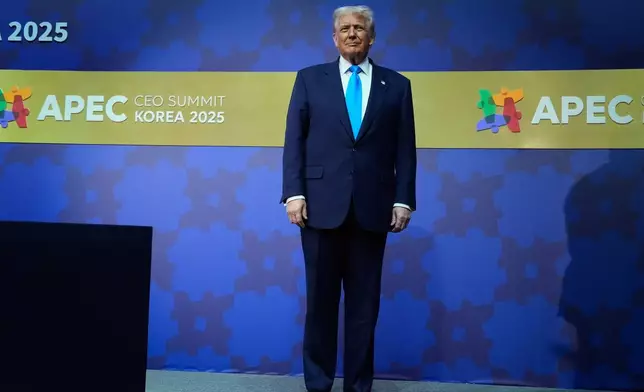 President Donald Trump arrives at an Asia-Pacific Economic Cooperation (APEC) CEO luncheon in Gyoeongju, South Korea, Wednesday, Oct. 29, 2025. (AP Photo/Mark Schiefelbein)