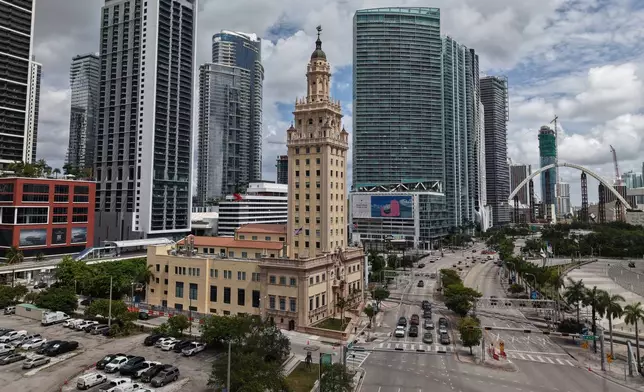 The Freedom Tower is seen in downtown Miami on Friday, Aug. 8, 2025. (AP Photo/Daniel Kozin)