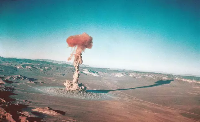 FILE - A sub-surface atomic test is shown March 23, 1955 at the Nevada Test Site near Yucca Flats, Nev. (U.S. Atomic Energy Commission via AP, File)