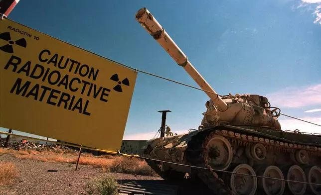 FILE - An M-48 tank which fired uranium-tipped shells in the 1970s sits at the Nevada Test Site on Aug. 24, 1999. (AP Photo/Laura Rauch, File)