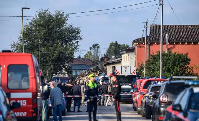 Police cordon off the scene of an explosion in the town of Castel d’Azzano, 10 km (six miles) southwest Verona, Italy, Tuesday, Oct. 14, 2025. (Claudio Furlan/LaPresse via AP)
